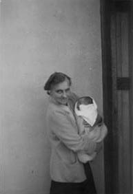 photo - when I was only a few days old; with my Grandmother