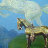 little metal horse with huge white flying unicorn in background
